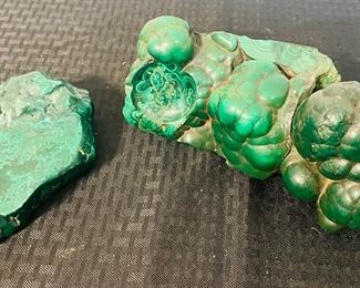 21	$90 	
2 pieces of raw malachite 	