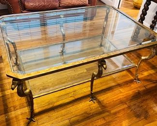24	$500 	
Hollywood regency coffee table with griffon 57Lx38Tx24D	