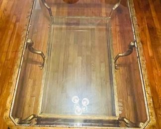 24	$500 	
Hollywood regency coffee table with griffon 57Lx38Tx24D	