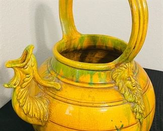 46	$250 	
Italian pottery yellow/green glazed wine urn with bacchus	