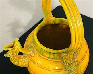 46	$250 	
Italian pottery yellow/green glazed wine urn with bacchus	