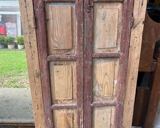 $220 Spanish window opening to a scene and iron work