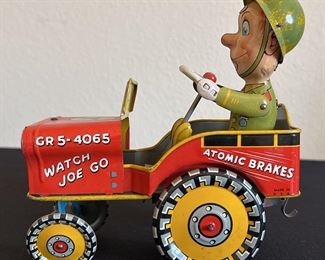 G. I. Joe And His Jouncing Jeep Tin Wind Up Toy