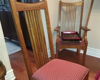 Six wood Slat- Back chairs with Padded Seats.  Two chairs have Arms (as shown in background.)  All six $150.00