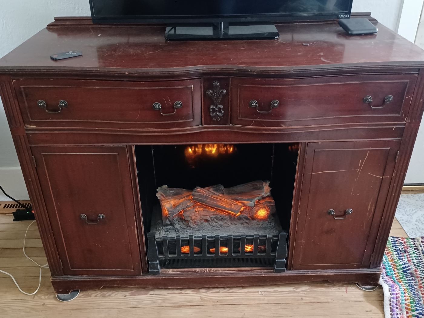 Cute Electric fireplace in vintage cabinet 