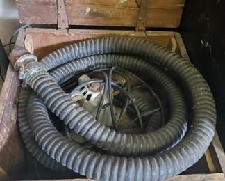 Antique wooden crate and hose 