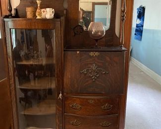 Gorgeous ornate curved glass secretart 