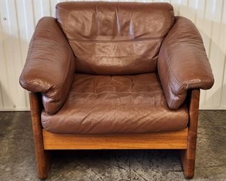 High quality Danish Modern solid teak and leather armchair by A. Mikael Laursen of Denmark.