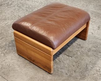Mid century high quality Danish Modern solid teak and leather ottoman by A. Mikael Laursen of Denmark.