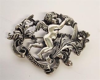 2 1/4" x 1 7/8" sterling silver "Aquarius" brooch from the Zodiac Series produced in the 1940s by well known jewelry artist Guglielmo Cini, 