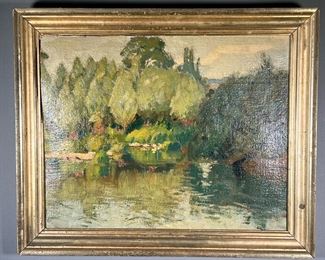 AMERICAN SCHOOL (19TH/20TH CENTURY) | waterside landscape oil on canvas showing green trees and shoreline along a body of water no apparent signature in an antique gilt frame. 
