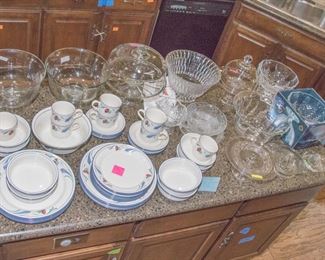 Crystal & glass:  $9.00 - $30.00.  Poppies On Blue by Lenox.  24 pc. set:  $280.00