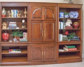 Wood (3) section bookshelf/entertainment center (78"h x 9'w x 78"h x 19.5" d)  The 3 sections are 38" w each.  $380.00 