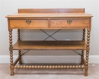 Oak Table w/spooled legs, 2 drawers (married pc.) (34"h x 45" w x20"d):  $120.00 (as is)