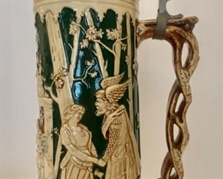 Large German Relief  Pottery Stein with  Castle Top  decorated with enamels 20 1/4"tall