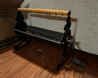 Vintage Cast Iron Newspaper Log Roller Fire Starter