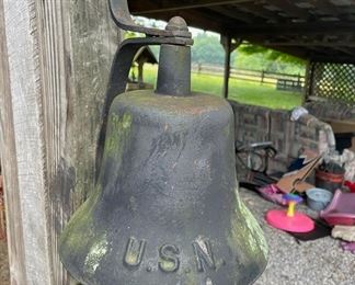 Antique USN (United States Navy ) Ships Bell with hanger. Their sound is like none other: Just read the following: "SPECIAL NAVY FORMULA BELL METAL: The tone of an authentic Navy bell, made using a special “bell metal” formula, is not easily forgotten. It has a strong and long resonance and vibration that rings sharp and clear with a distinctive sound. Do not expect cheap imitations or foreign imports to have this special characteristic ringing because “bell metal” is a specially formulated bronze alloy, unique to the Navy for their specialized use."