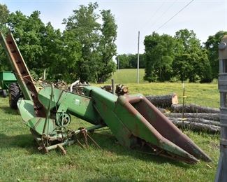 John Deere Corn Picker with this one, "parts is parts"