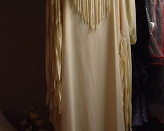 Gorgeous Clothing all in New to Like New Condition and featuring everything from Fine Sequined Gowns to Renaissance to “Knock Out” Lingerie to Vest to American Indian to “All absolutely beautiful clothing!”