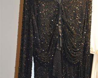 Gorgeous Clothing all in New to Like New Condition and featuring everything from Fine Sequined Gowns to Renaissance to “Knock Out” Lingerie to Vest to American Indian to “All absolutely beautiful clothing!”