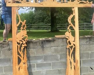 Gorgeous German Hand Carved Door Frame  for an inviting ambience when entering an home for Exterior or setting the mood for an Interior Doorway– It was purchased in Germany in the 90’s – wrapped and never unwrapped since purchasing and moved with them from place to place as they were world travelers. 
This magnificent hand carved door frame is carved from wood planks that are 16” in width and 2” thick. The Upper Carved Frame is 84” wide. The side panels are 82” tall interlocking with the Upper Frame making a height of 96” or 8’ and the width is 84” or 7’. Each panel is made of one solid piece of beautiful cedar. 
