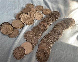 Morgan and peace dollars.. cash only accepted on coins. 