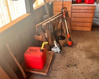 weed whips and gas cans 