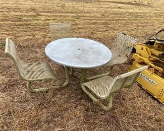 OUTDOOR TABLE WITH FOUR CONNECTED CHAIRS