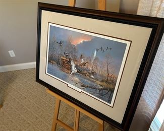 Framed print "Checking in at the Hilton" by R. J. McDonald