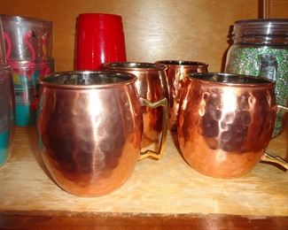 Copper Moscow Mule Mugs. Why copper?  The metal conducts the temp which keeps the mule cold and frosty and enhances the vodka flavor.  Cheers!!
