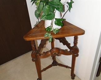Nice corner table with faux plant