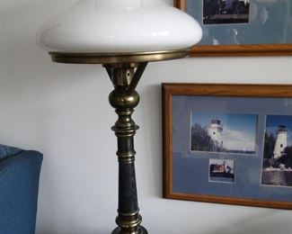 Tall glass and brass lamp