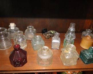 Small ornate, glass bottles and jars