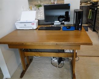 Yeah, may be a computer table now, but just think of the amazing dinners, and guests that you can fit around this table
