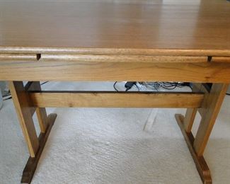 Solid wood, with expanding leaf table