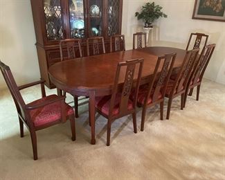 Ricardo Lynn & Co Teak Dinning Room Set: Table, China Cabinet & Server.          $ 2,750.00 group                                                                                      Table: 101.75" L, 44" W, 29.5" H includes  (2) leaves 36" W each.  ( 8) side chairs (2) Captain Chairs  