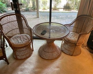 Rattan Bistro Set Glass top Table and 4 Chairs.             Table : 32.75" Diameter 26.75" T                                                             Chairs: 23.25" W 37.75" T 17.5" floor to seat