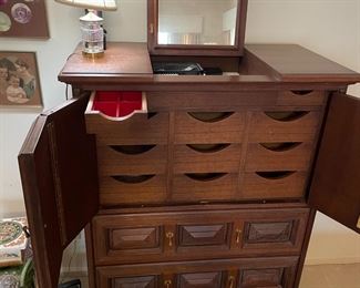 Ricardo Lynn & Co  Teak Chest with  Mirror $350.00            Pop-Up Mirror and 2 jewelry compartments                                           38" W 20" D 53.5" T