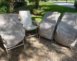 Metal adjustable outdoor chairs 3 with covers. $20.00 each