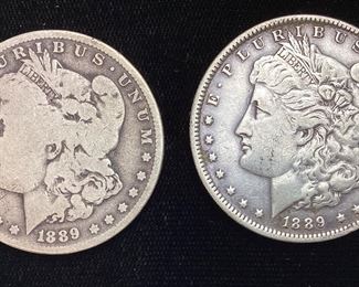 (2) 1889-O MORGAN SILVER DOLLARS