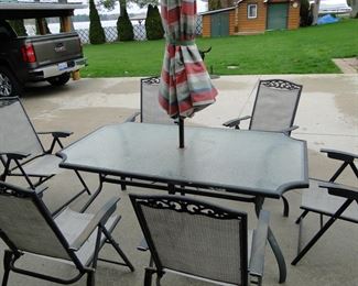 Complete patio set.  All 9 pieces