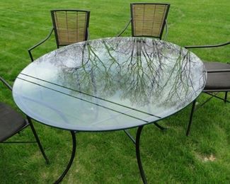 Large round glass top table and chair set