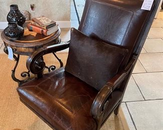 One of pair of leather chairs Paul Roberts