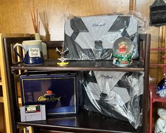 Harley stuff… pocket watch holder, pottery mug, crown royal items, Star Wars santa Yoda snow globe, Super Nintendo Mario’s world game