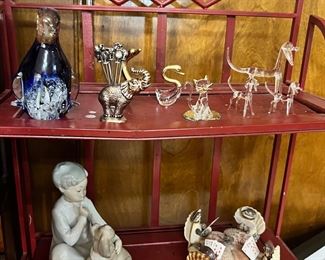 Lladro (we think) figure with dog and some killer shell turtles playing cards…  some blown glass air Yakut pieces above.