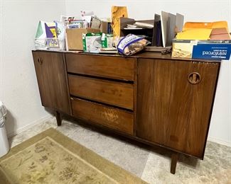 This MCM piece matches the desk, but it sure would be a great cradenza, TV stand or entry way table. We didn’t touch it, but a little old English would go a long way and those scratches came out way worse in this picture than they really are, guess the flash is to blame. 