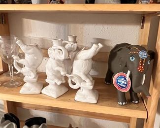 Great elephant collection… love the white book ends and candle holder set and the Fitz & Floyd colored bookends are ceramic.
