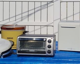 Williams Sonoma breadmaker, George Forman grill, microwave, toaster ovens, Cuisinart coffee maker, Crock pot