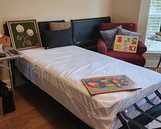 Twin mattress, springs, and Hollywood frame.  Two matching headboards sold seperately