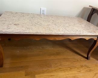 Marble Coffee and End Table Set.  Features a cherry base and marble top in peach and taupe. End tables include a base shelf for added storage. Excellent condition. Smoke-free and pet-free home. 
Coffee table: 41"x21"x15" tall
End tables: 18"x28"x22" tall
Price:  $500